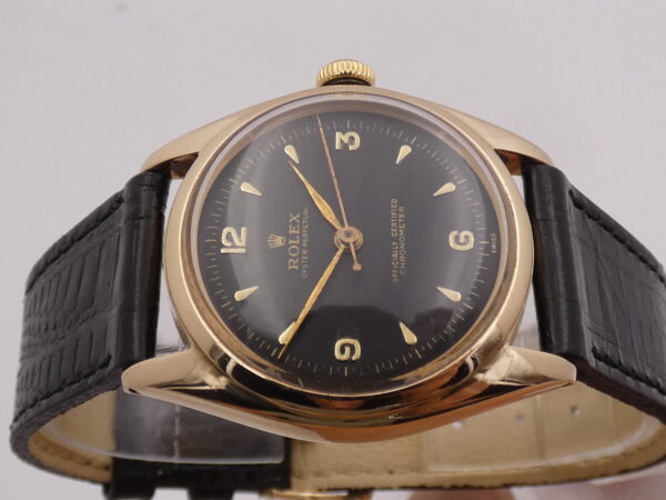Rolex Oyster Perpetual From 1950 GILT 4392 Bubbleback Ovetto Automatic Chronometer Oro 14Kt Leaf Hands